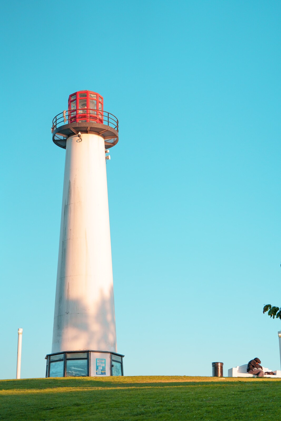 Long Beach lighthouse photographed against a bright blue sky